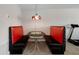 Charming breakfast nook with retro diner booth, perfect for casual dining and morning coffee at 8780 Flourish Dr, Land O Lakes, FL 34637