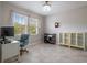 Bright office featuring a computer, a printer and display shelving at 8780 Flourish Dr, Land O Lakes, FL 34637