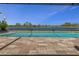 Beautiful pool overlooking a tranquil lake, perfect for relaxing and enjoying the serene view at 8780 Flourish Dr, Land O Lakes, FL 34637