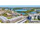 Scenic aerial view showcases the building's proximity to the serene lake and community amenities at 9950 62Nd N Ter # 319, St Petersburg, FL 33708