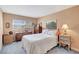 Inviting bedroom with neutral color scheme and large window for natural light at 9950 62Nd N Ter # 319, St Petersburg, FL 33708