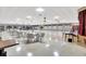 Large hall featuring tile floors, neutral walls, and ample seating arrangements at 9950 62Nd N Ter # 319, St Petersburg, FL 33708