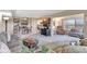 Spacious living room with comfortable seating, carpeted floor, and neutral color scheme at 9950 62Nd N Ter # 319, St Petersburg, FL 33708