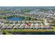 Aerial view of the neighborhood with lakes and nearby shopping centers at 11422 Captiva Kay Dr, Riverview, FL 33569