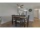 Comfortable dining area adjacent to the kitchen with wood flooring and modern finishes at 117 Martha Ln # 117, Oldsmar, FL 34677