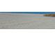 Beautiful ocean view with sand and small shrubs in clear skies at 1180 Gulf Blvd # 1604, Clearwater Beach, FL 33767