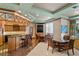 Stylish entertainment room with a wet bar, comfortable seating, and a flatscreen TV for relaxation and gatherings at 1180 Gulf Blvd # 1604, Clearwater Beach, FL 33767