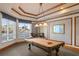 Entertaining game room boasts a classic pool table, accent lighting, and sophisticated finishes at 1180 Gulf Blvd # 1604, Clearwater Beach, FL 33767