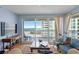 Comfortable living room showcasing balcony access with amazing ocean views at 1180 Gulf Blvd # 1604, Clearwater Beach, FL 33767
