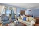 Cozy living room with sophisticated decor and balcony access with spectacular views at 1180 Gulf Blvd # 1604, Clearwater Beach, FL 33767
