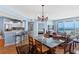 Spacious living space featuring an open floor plan with dining room, kitchen, and ocean views at 1180 Gulf Blvd # 1604, Clearwater Beach, FL 33767