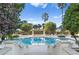 Resort-style pool surrounded by lush landscaping, offering a serene and inviting atmosphere at 1180 Gulf Blvd # 1604, Clearwater Beach, FL 33767