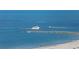 Scenic view of boats sailing along the water, showcasing the waterfront lifestyle and ocean activities at 1180 Gulf Blvd # 1604, Clearwater Beach, FL 33767