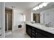 Bathroom featuring a large soaking tub, shower, and double sink vanity at 12220 Legacy Bright St, Riverview, FL 33578