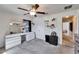 This bedroom features a ceiling fan and attached makeup area at 12220 Legacy Bright St, Riverview, FL 33578