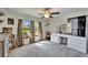 Bedroom with large windows, and a modern vanity at 12220 Legacy Bright St, Riverview, FL 33578