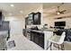 Well-equipped kitchen boasts modern appliances, granite countertops, and an open layout at 12220 Legacy Bright St, Riverview, FL 33578