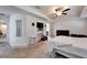Large main bedroom with neutral carpet, ceiling fan, and plenty of natural light at 12220 Legacy Bright St, Riverview, FL 33578