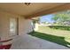 Covered patio overlooking a spacious backyard and white picket fence at 12220 Legacy Bright St, Riverview, FL 33578