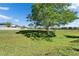 Expansive yard with lush greenery, providing plenty of space for recreation at 12220 Legacy Bright St, Riverview, FL 33578