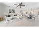 Open-concept living room flows seamlessly into kitchen and dining area, great for entertaining at 12377 Streambed Dr, Riverview, FL 33579