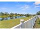 Picturesque water view with lily pads visible from the backyard at 12377 Streambed Dr, Riverview, FL 33579