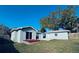 The home boasts a spacious backyard, perfect for outdoor activities and relaxation at 1409 Franklin St, Clearwater, FL 33756