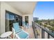 Balcony with lounge chairs and ocean view at 1480 Gulf Blvd # 401, Clearwater Beach, FL 33767