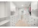 Spacious walk-in closet with built-in shelving and drawers for optimal organization at 1480 Gulf Blvd # 401, Clearwater Beach, FL 33767
