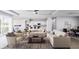 Inviting living room featuring neutral decor, an open floor plan, and seamlessly connecting to the kitchen at 15513 Aldama Cir, Port Charlotte, FL 33981