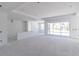 Open-concept living room under construction featuring recessed lighting and access to various rooms at 15513 Aldama Cir, Port Charlotte, FL 33981