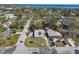 Scenic aerial view of the neighborhood, highlighting the property's location among lush trees and proximity to the water at 1600 Delaware Ne Ave, St Petersburg, FL 33703