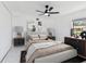 Stylishly staged bedroom with neutral tones, modern furnishings, and ample natural light at 1600 Delaware Ne Ave, St Petersburg, FL 33703