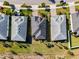 Aerial view showcasing neatly arranged homes with well-maintained lawns and streets in a suburban neighborhood at 17533 Timberline Pkwy, Punta Gorda, FL 33982