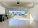 Neat, spacious garage with an open door offering a view of the well-maintained neighborhood at 17533 Timberline Pkwy, Punta Gorda, FL 33982