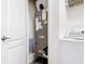 HVAC system located inside of a closet next to the laundry room, features a Lennox central air conditioning unit at 17533 Timberline Pkwy, Punta Gorda, FL 33982
