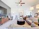 Spacious living room showcasing modern decor, neutral colors, and an open layout connecting to other living spaces at 17533 Timberline Pkwy, Punta Gorda, FL 33982