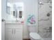Elegant bathroom featuring a modern vanity, LED mirror, and a marble-tiled shower for a luxurious feel at 1902 Andover St # 198, Sun City Center, FL 33573