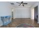 Spacious bedroom offers ample storage with its wide closet and features stylish flooring and a modern table at 1902 Andover St # 198, Sun City Center, FL 33573