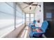 Relaxing lanai with tile floors, ceiling fan and comfortable seating at 1902 Andover St # 198, Sun City Center, FL 33573