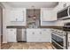 Open kitchen with stainless steel appliances at 2335 E Del Webb Blvd, Sun City Center, FL 33573