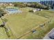 Active lifestyle shown in this aerial image of the pristine lawn bowling fields at the community at 2335 E Del Webb Blvd, Sun City Center, FL 33573
