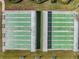 Aerial shot of shuffleboard courts with covered seating at 2335 E Del Webb Blvd, Sun City Center, FL 33573