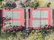 Aerial of well-maintained community tennis courts surrounded by trees at 2335 E Del Webb Blvd, Sun City Center, FL 33573