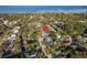 Stunning aerial view of a neighborhood showcasing lush greenery and the property's proximity to the water at 314 Ontario Ave, Crystal Beach, FL 34681