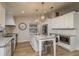 Modern kitchen featuring stainless steel appliances and a convenient island at 314 Ontario Ave, Crystal Beach, FL 34681