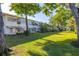 Well maintained property with a beautifully landscaped lawn and mature trees that provide plenty of shade at 4152 56Th N Way # 614, Kenneth City, FL 33709