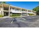 Inviting condo complex featuring well-maintained grounds and ample parking at 4152 56Th N Way # 614, Kenneth City, FL 33709