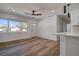 Inviting living area with sleek flooring, an open layout, and modern fixtures that offer natural light and create a cozy atmosphere at 4712 W Iowa Ave, Tampa, FL 33616