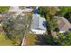 Aerial view of the home showcasing its roof and the surrounding fenced backyard at 509 13Th Nw Ave, Largo, FL 33770